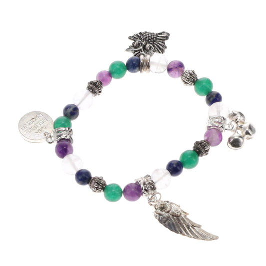A colorful Affirmation Crystal Wisdom Bracelet with various beads, charms including a feather and a sun, and inscribed charms in a silver-tone setting.