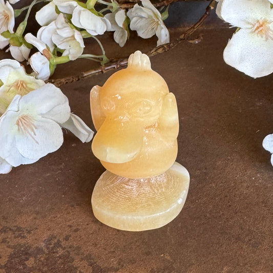 Orange Calcite Crystal Psyduck Pokémon Carving – Emotional Healing, Intuition & High-Vibration Joy
